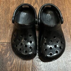 Black shiny crocs